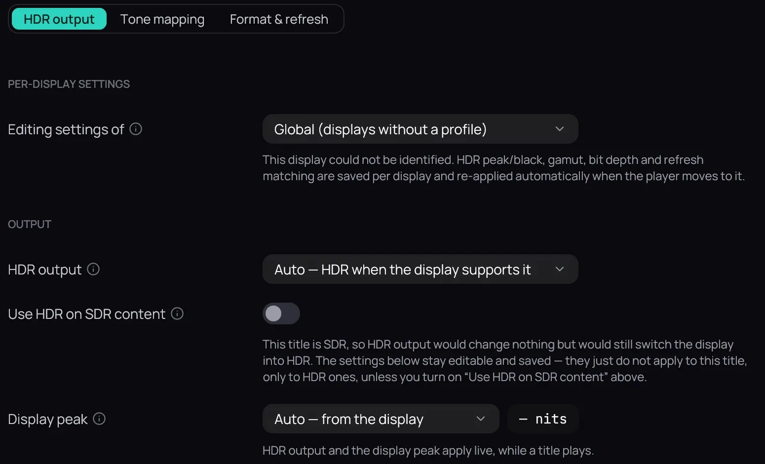 Settings › Display & HDR on its HDR output tab while an SDR film is open: Per-display settings on the global profile, then HDR output on Auto — HDR when the display supports it, Use HDR on SDR content off with the notice that this title is SDR, so the settings do not apply to it, and Display peak on Auto — from the display