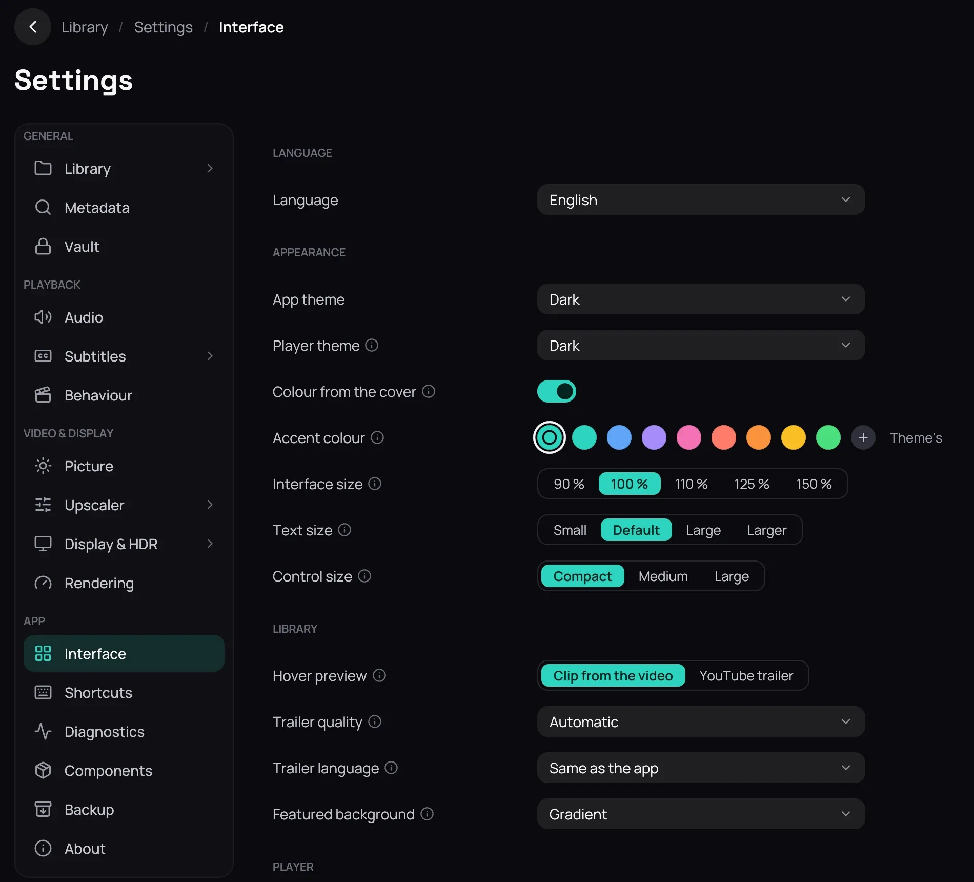 Settings shown on the Interface section: the rail listing all sixteen sections with Interface selected under App, and beside it Language on English, App theme and Player theme on Dark, Colour from the cover on, the accent swatches on Theme's, Interface size 100 %, Text size Default, Control size Compact, Hover preview on Clip from the video, Trailer quality and language, and Featured background on Gradient rather than the default Title artwork, above the Player group's heading.