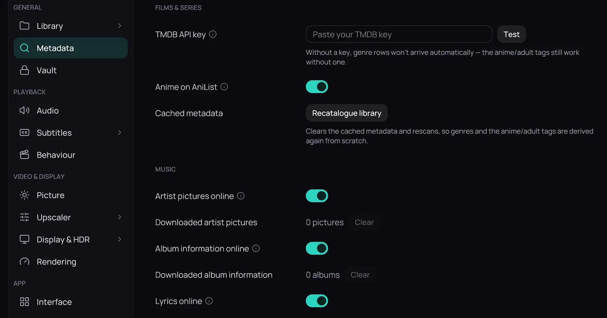 Settings with Metadata chosen in the rail: an empty TMDB API key field, the note that genre rows need a key, Anime on AniList on, Artist pictures online on, Downloaded artist pictures with Clear, Album information online on, Downloaded album information with Clear, and Lyrics online on
