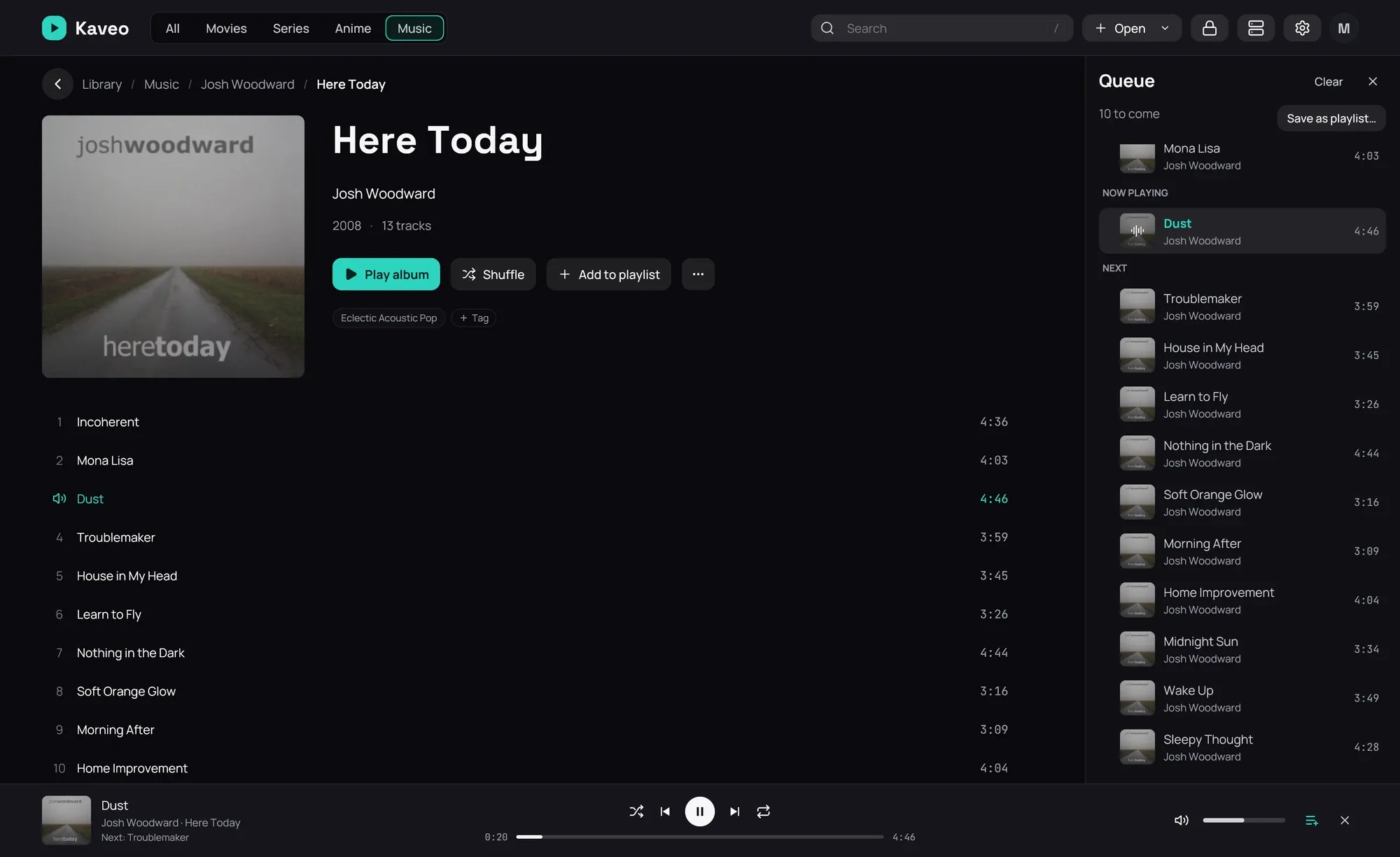 The album page with the queue open on the right: a played track at the top, then Now playing with the current track in the accent colour, then Next with the tracks to come, each with its cover, artist and length, and Clear and Save as playlist… at the top